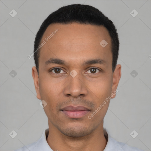 Neutral latino young-adult male with short  black hair and brown eyes