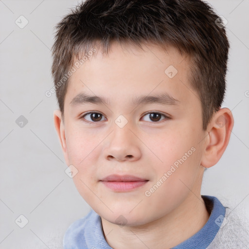 Joyful white child male with short  brown hair and brown eyes