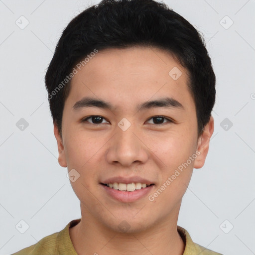 Joyful white young-adult male with short  black hair and brown eyes