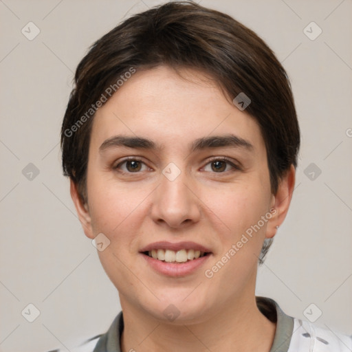 Joyful white young-adult female with short  brown hair and brown eyes