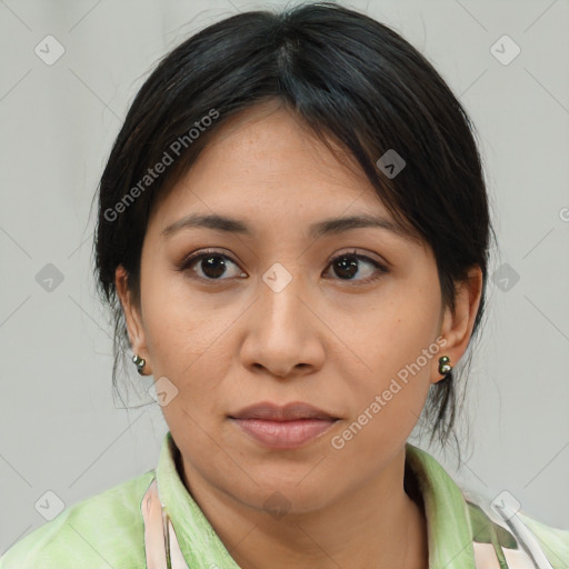 Joyful asian young-adult female with medium  brown hair and brown eyes