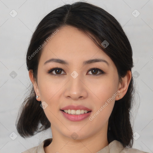 Joyful asian young-adult female with medium  brown hair and brown eyes