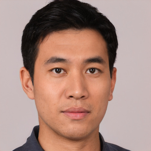 Neutral asian young-adult male with short  black hair and brown eyes