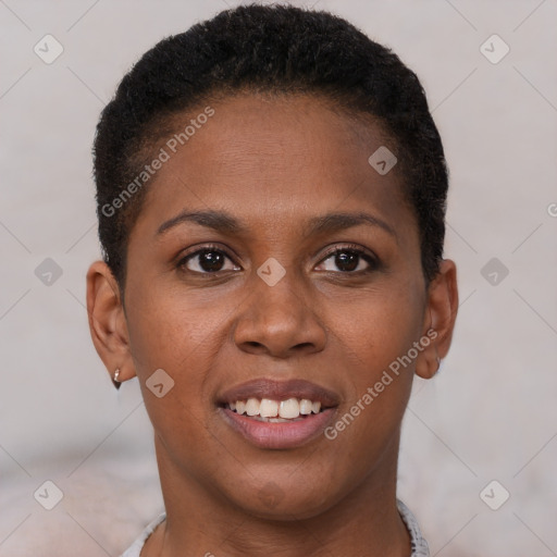 Joyful black young-adult female with short  brown hair and brown eyes