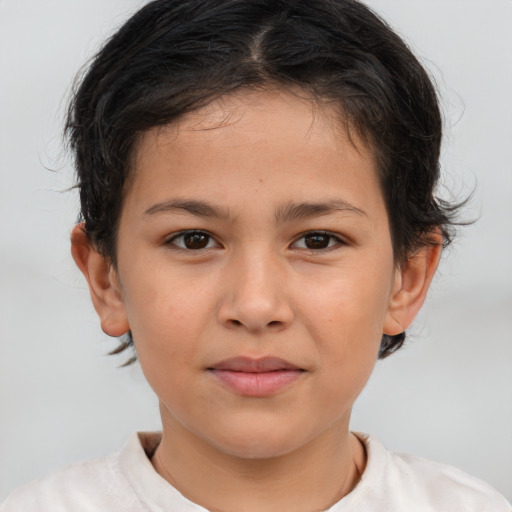 Joyful white child female with short  brown hair and brown eyes
