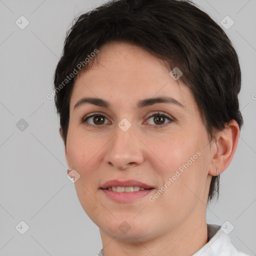 Joyful white young-adult female with short  brown hair and brown eyes