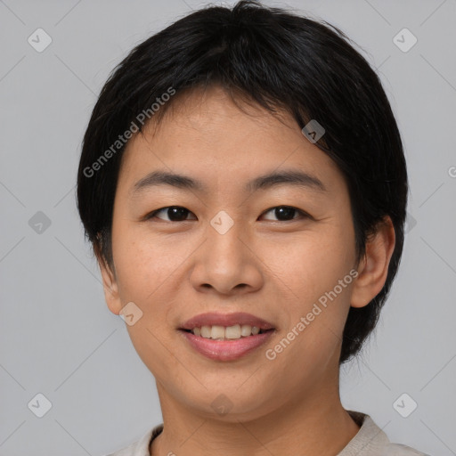 Joyful asian young-adult female with medium  brown hair and brown eyes