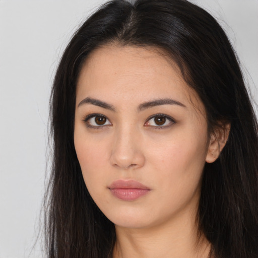Neutral asian young-adult female with long  brown hair and brown eyes