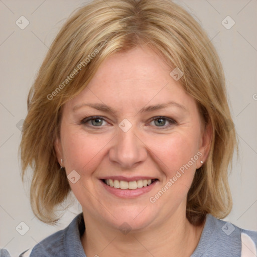 Joyful white young-adult female with medium  brown hair and blue eyes