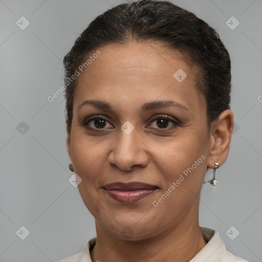 Joyful white adult female with short  brown hair and brown eyes