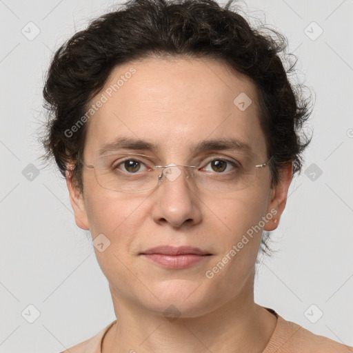 Joyful white adult female with short  brown hair and brown eyes