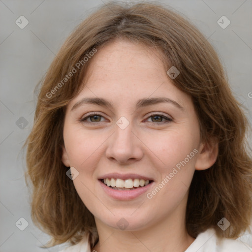 Joyful white young-adult female with medium  brown hair and green eyes