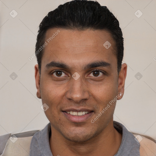 Joyful white young-adult male with short  black hair and brown eyes