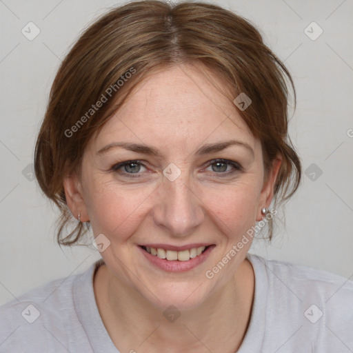 Joyful white young-adult female with medium  brown hair and blue eyes