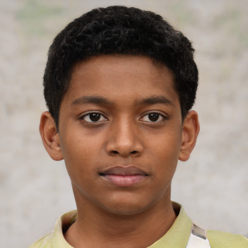 Neutral black child male with short  black hair and brown eyes