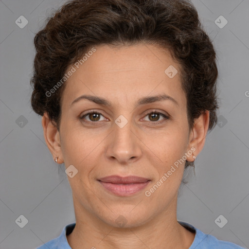 Joyful white adult female with short  brown hair and brown eyes