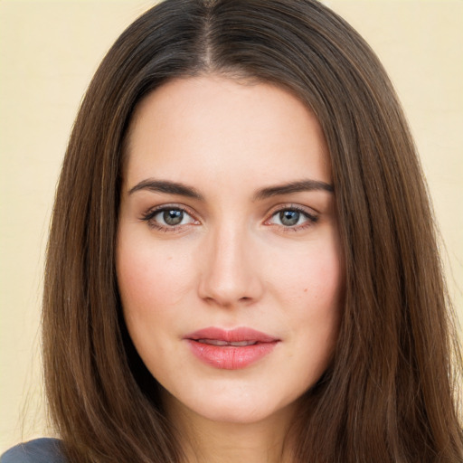 Neutral white young-adult female with long  brown hair and brown eyes