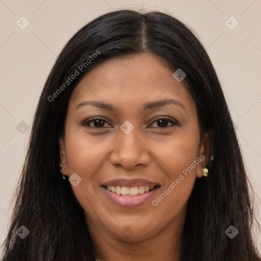 Joyful latino young-adult female with long  brown hair and brown eyes