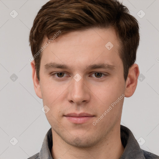 Neutral white young-adult male with short  brown hair and grey eyes