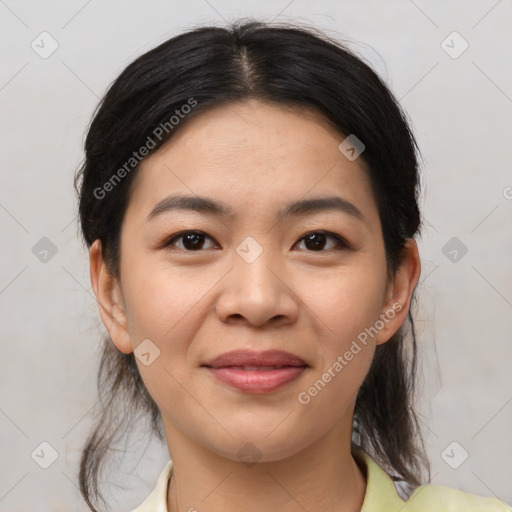 Joyful asian young-adult female with medium  brown hair and brown eyes