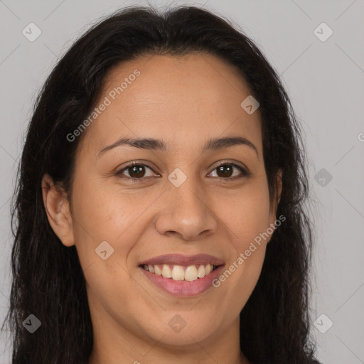 Joyful latino young-adult female with long  brown hair and brown eyes