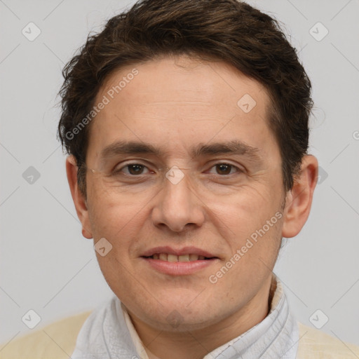 Joyful white adult male with short  brown hair and brown eyes