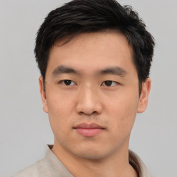 Neutral asian young-adult male with short  black hair and brown eyes