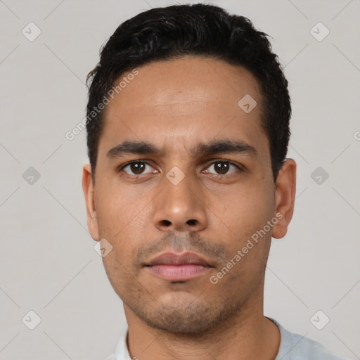 Neutral latino young-adult male with short  black hair and brown eyes