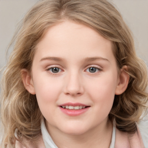 Joyful white child female with medium  brown hair and grey eyes