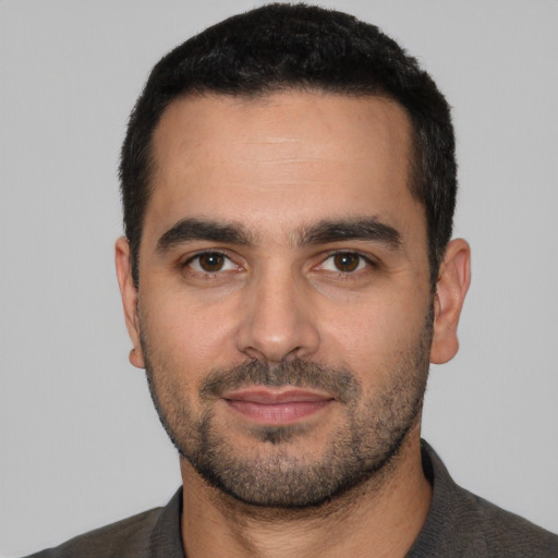 Neutral white young-adult male with short  black hair and brown eyes