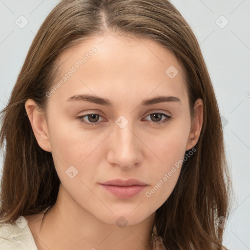 Neutral white young-adult female with long  brown hair and brown eyes