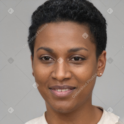 Joyful black young-adult female with short  black hair and brown eyes