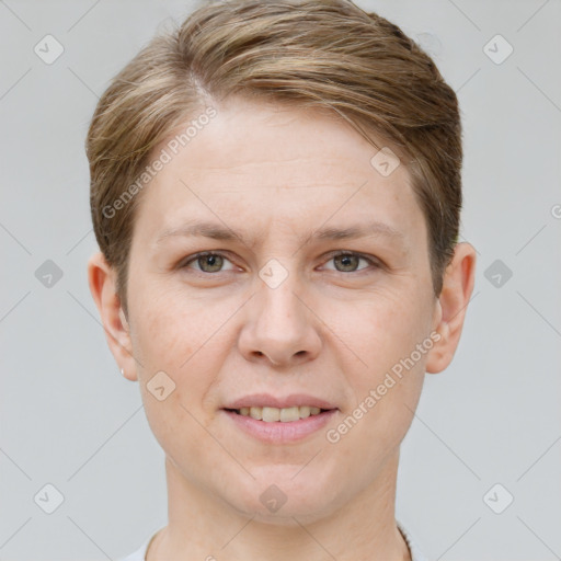 Joyful white adult female with short  brown hair and grey eyes