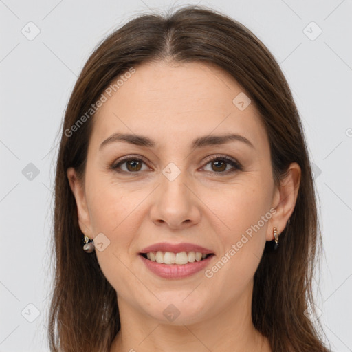 Joyful white young-adult female with long  brown hair and brown eyes