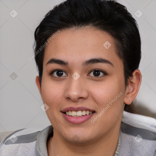 Joyful latino young-adult female with short  brown hair and brown eyes