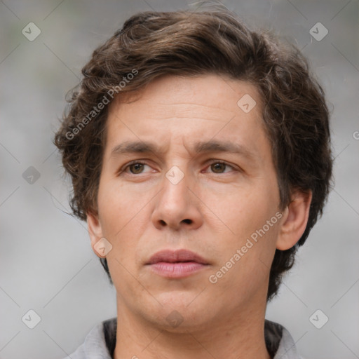 Neutral white adult male with short  brown hair and brown eyes