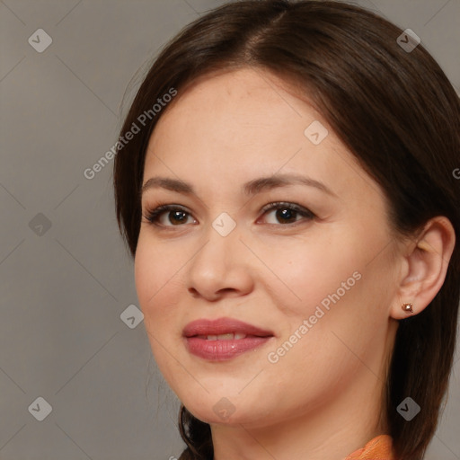 Joyful white young-adult female with medium  brown hair and brown eyes