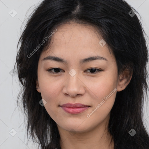 Joyful asian young-adult female with long  brown hair and brown eyes