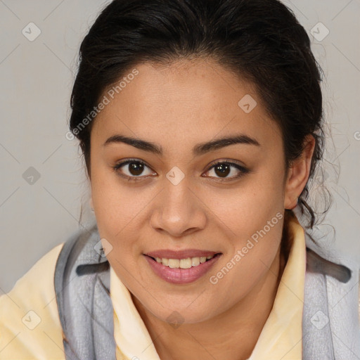 Joyful latino young-adult female with medium  brown hair and brown eyes