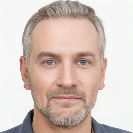 Neutral white adult male with short  brown hair and grey eyes