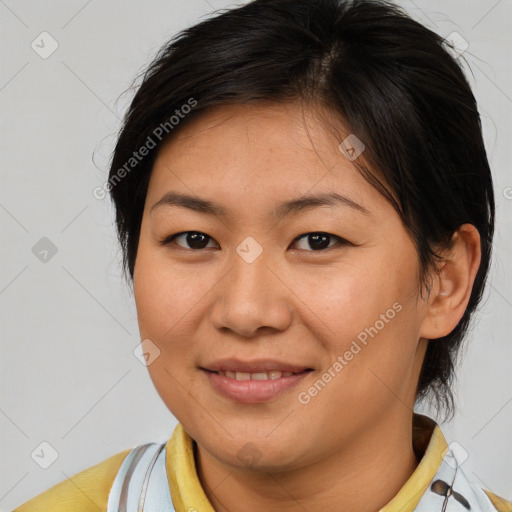 Joyful asian young-adult female with medium  brown hair and brown eyes