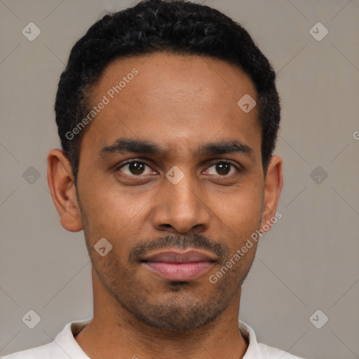 Neutral latino young-adult male with short  black hair and brown eyes