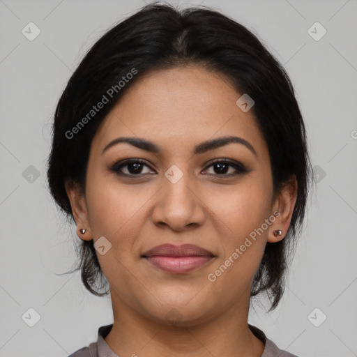 Joyful latino young-adult female with medium  black hair and brown eyes