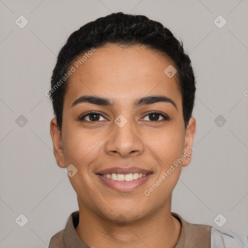 Joyful latino young-adult female with short  black hair and brown eyes