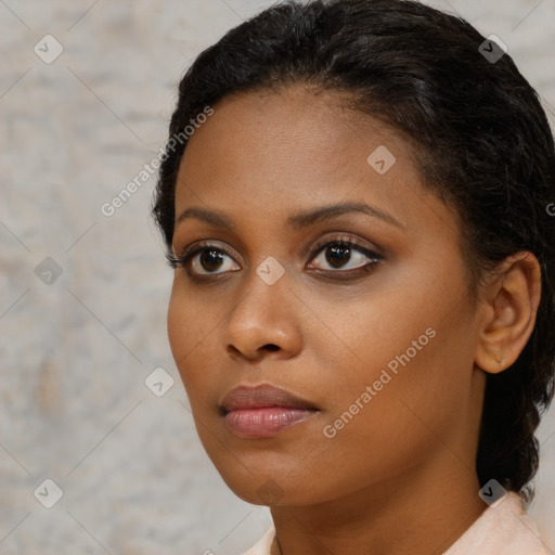 Neutral black young-adult female with short  brown hair and brown eyes