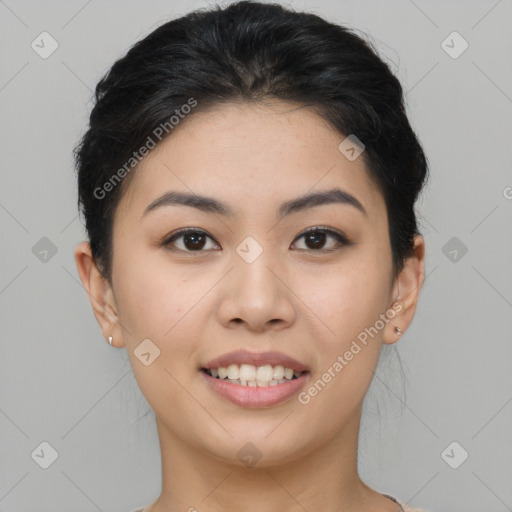 Joyful asian young-adult female with short  brown hair and brown eyes