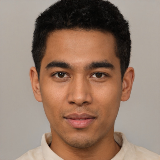 Neutral latino young-adult male with short  black hair and brown eyes
