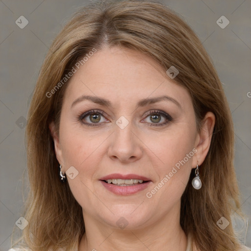 Joyful white adult female with medium  brown hair and grey eyes