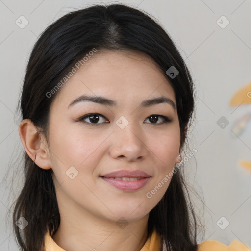 Joyful asian young-adult female with long  brown hair and brown eyes