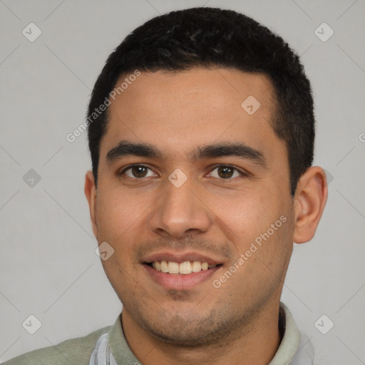 Joyful white young-adult male with short  black hair and brown eyes